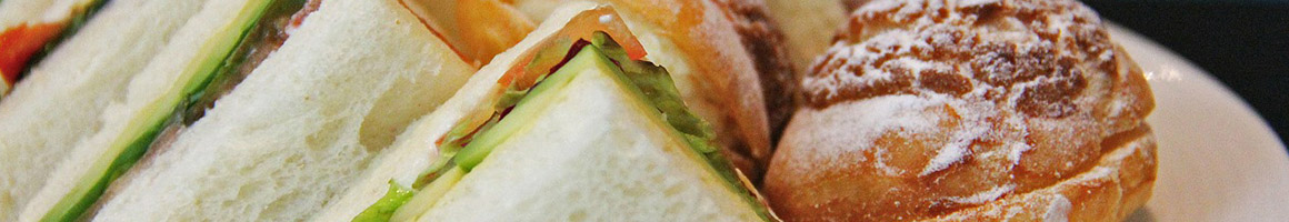 Eating Breakfast & Brunch Sandwich at The Lunch Café restaurant in Berkley, MI.